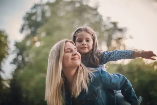 happy mum and daughter following mediation to resolve parental alienation Harlow